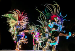 Exotic Aztec-looking dancers with colorful headdresses performing during Santa Barbara's Old Spanish Days Fiesta