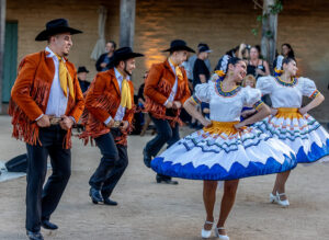 Old Spanish Days Fiesta dancers performing at the De La Guerra Adobe in Santa Barbara