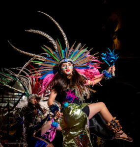 Aztec dancer performing during Fiesta in front of the Santa Barbara County Courthouse